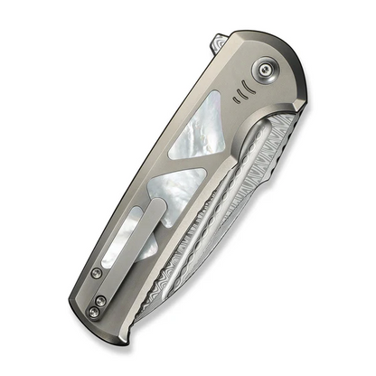 WE Knife Co., Ltd™ Sylox Button Lock WE24027-DS1 Polished 6AL4V Titanium and Mother-of-Pearl Damasteel Pocket Knife