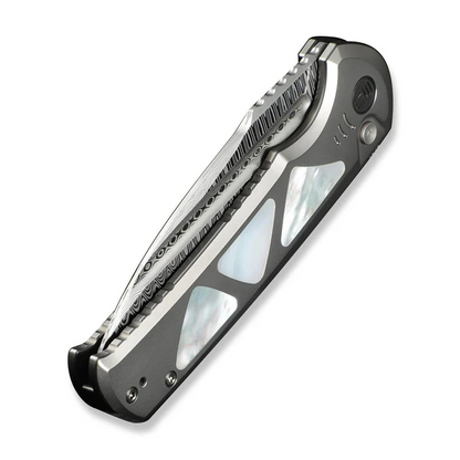 WE Knife Co., Ltd™ Sylox Button Lock WE24027-DS1 Polished 6AL4V Titanium and Mother-of-Pearl Damasteel Pocket Knife